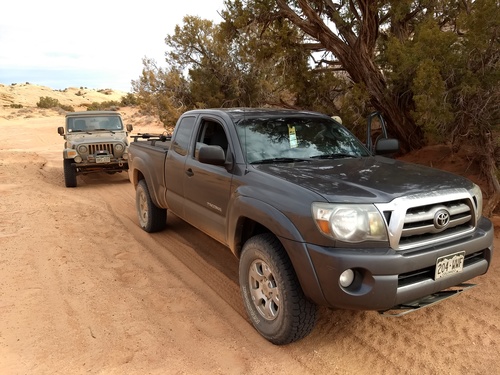 Taco and LJ in sandy wash